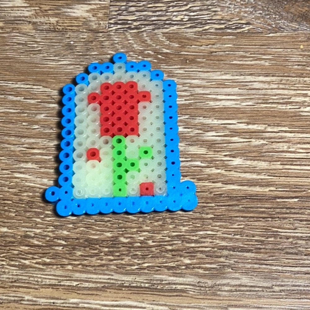 Flower perler bead made by 9 year old Veda